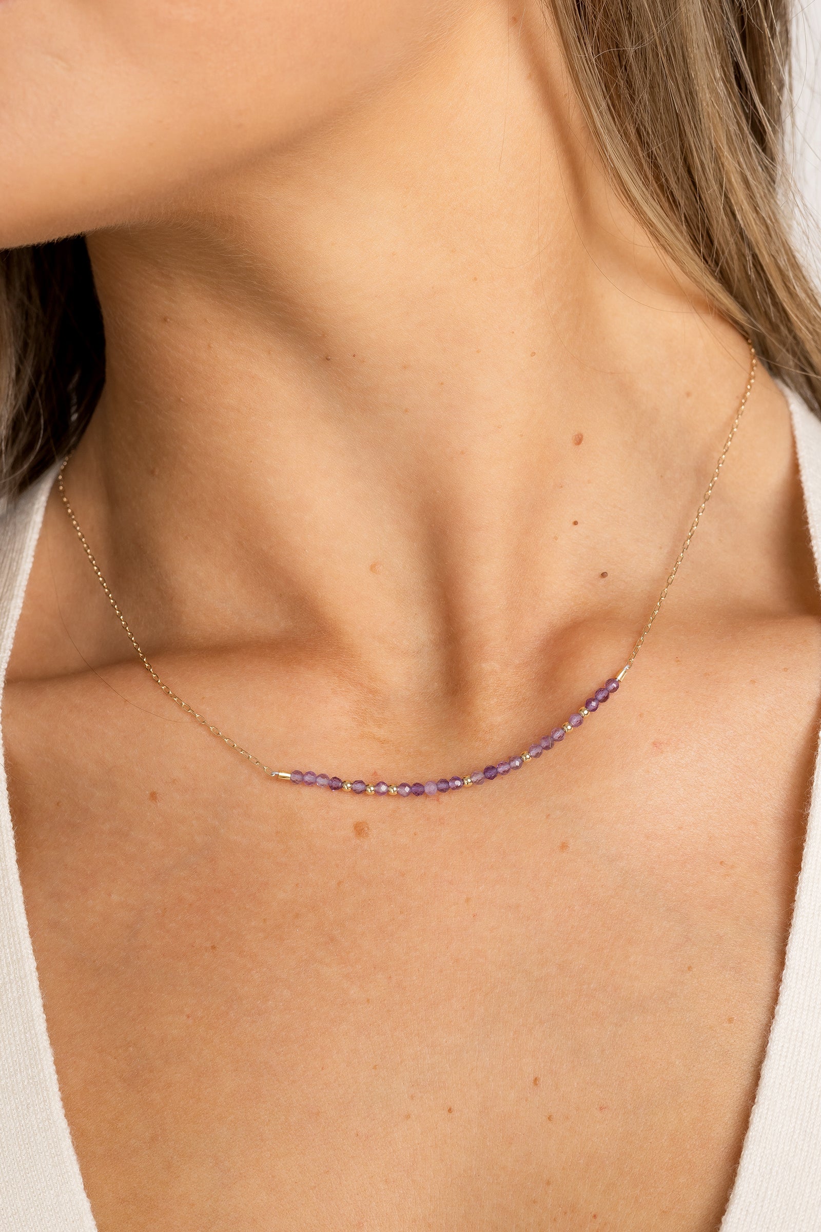February birthstone bar necklace with amethyst beads on a gold filled chain.