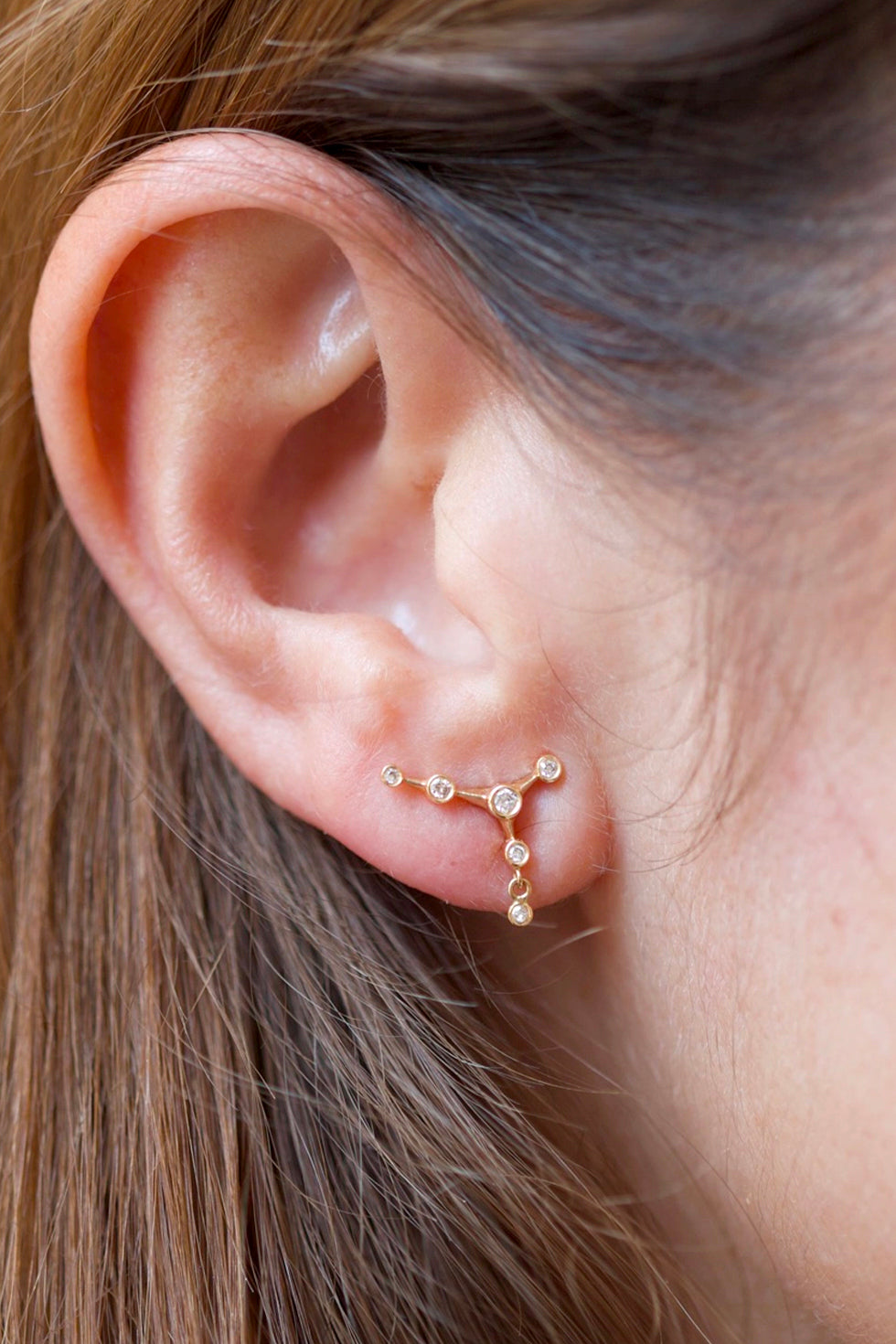 Diamond constellation stud earrings in 14k yellow gold by Celine Daoust.