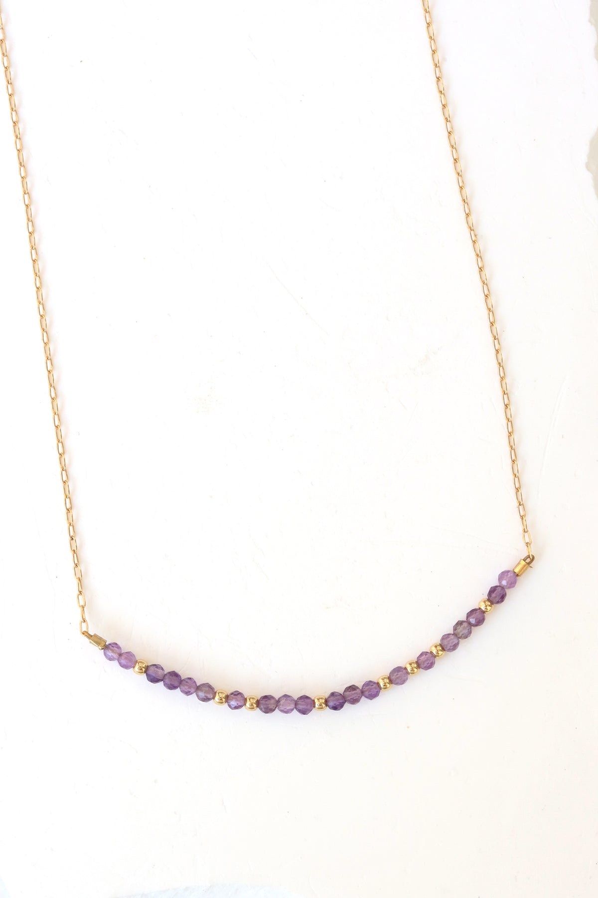 February birthstone bar necklace with amethyst beads on a gold filled chain.