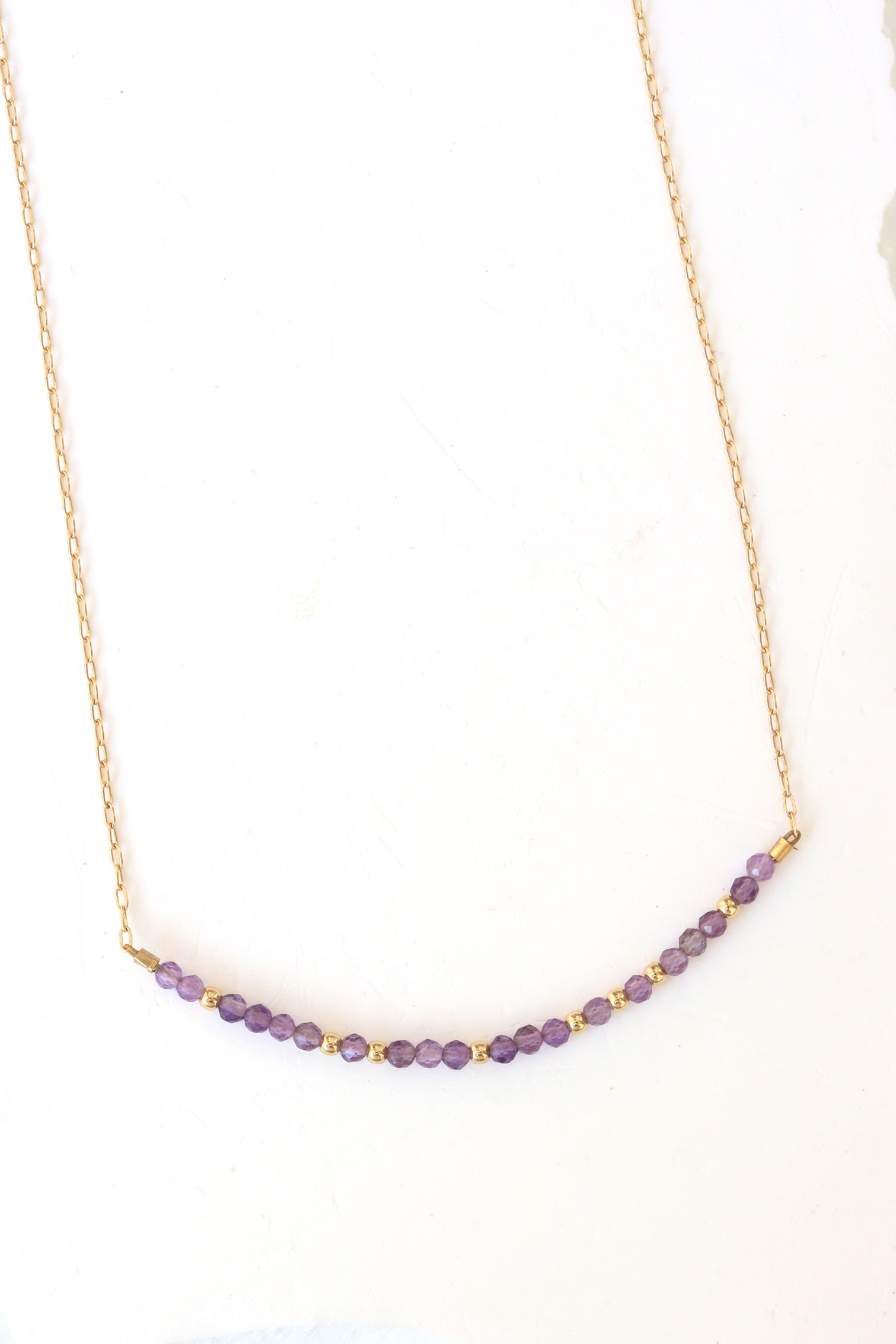 February birthstone bar necklace with amethyst beads on a gold filled chain.