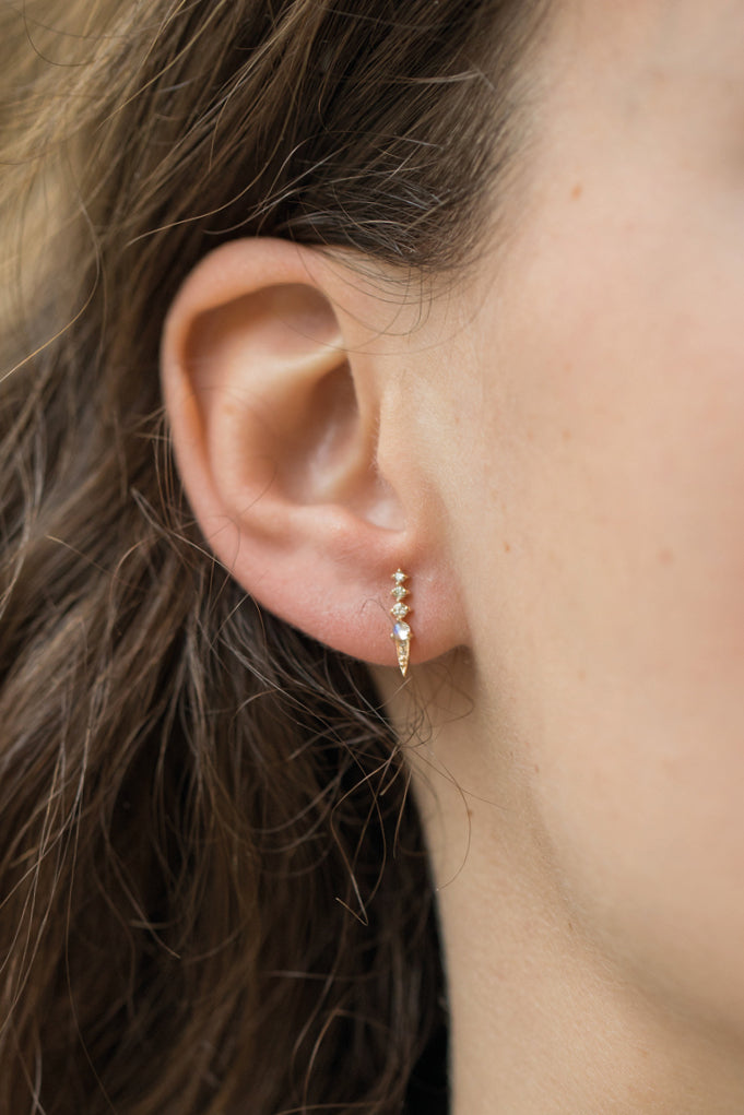 Moonstone and diamond single earring in 14k yellow gold by Celine Daoust.
