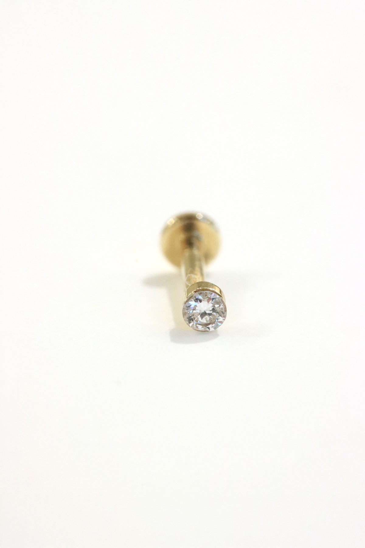 2mm round lab diamond threaded flat back stud in 14K yellow gold