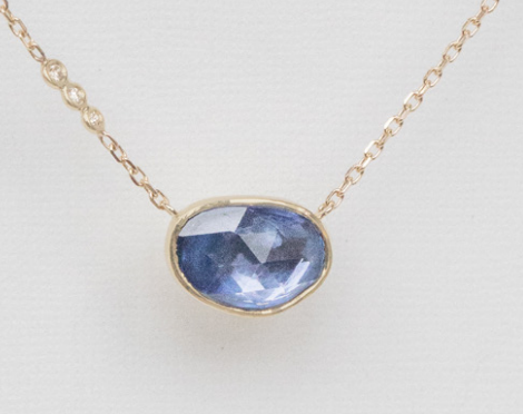 Tanzanite and three diamond pendant necklace in 14k yellow gold by Celine Daoust.