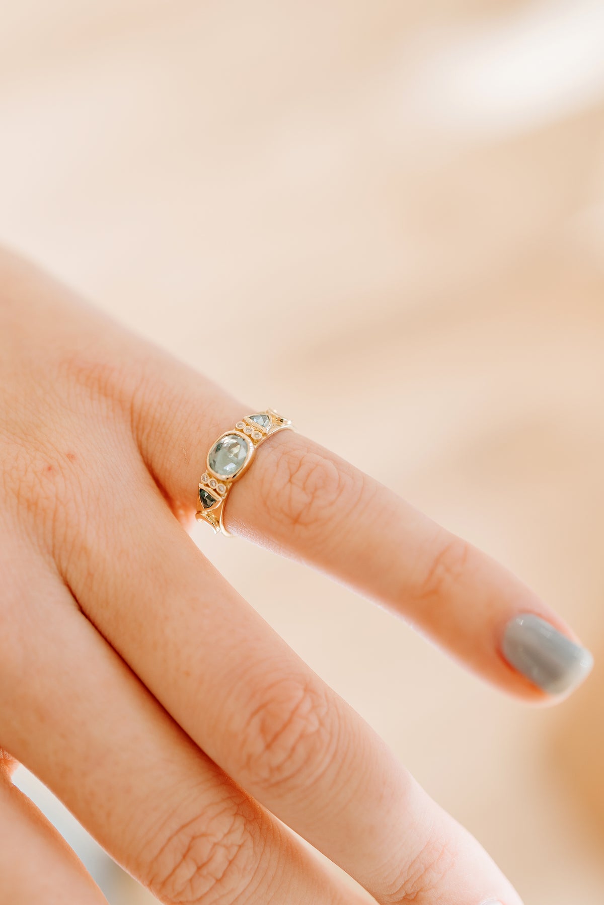 Blue tourmaline totem ring in 14k yellow gold with rose cut diamonds by Celine Daoust.