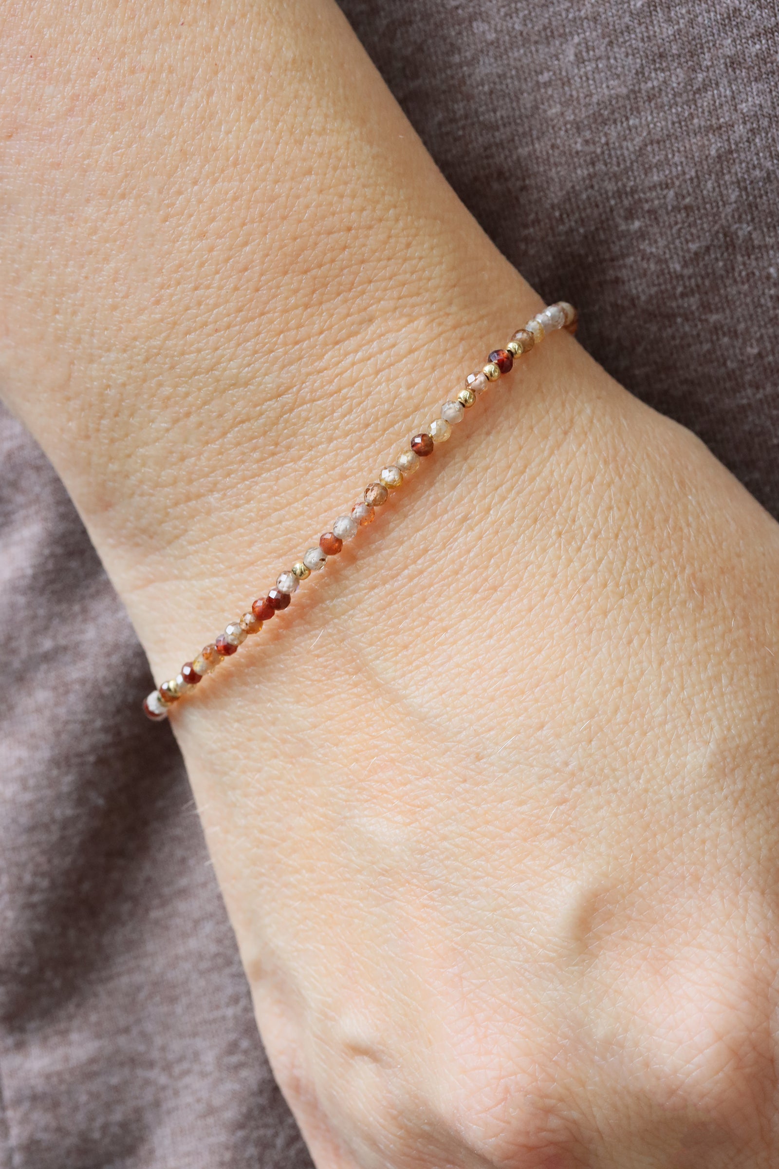 Chocolate zircon beaded bracelet with herkimer accent and gold filled clasp, handmade by Mickey Lynn in Atlanta
