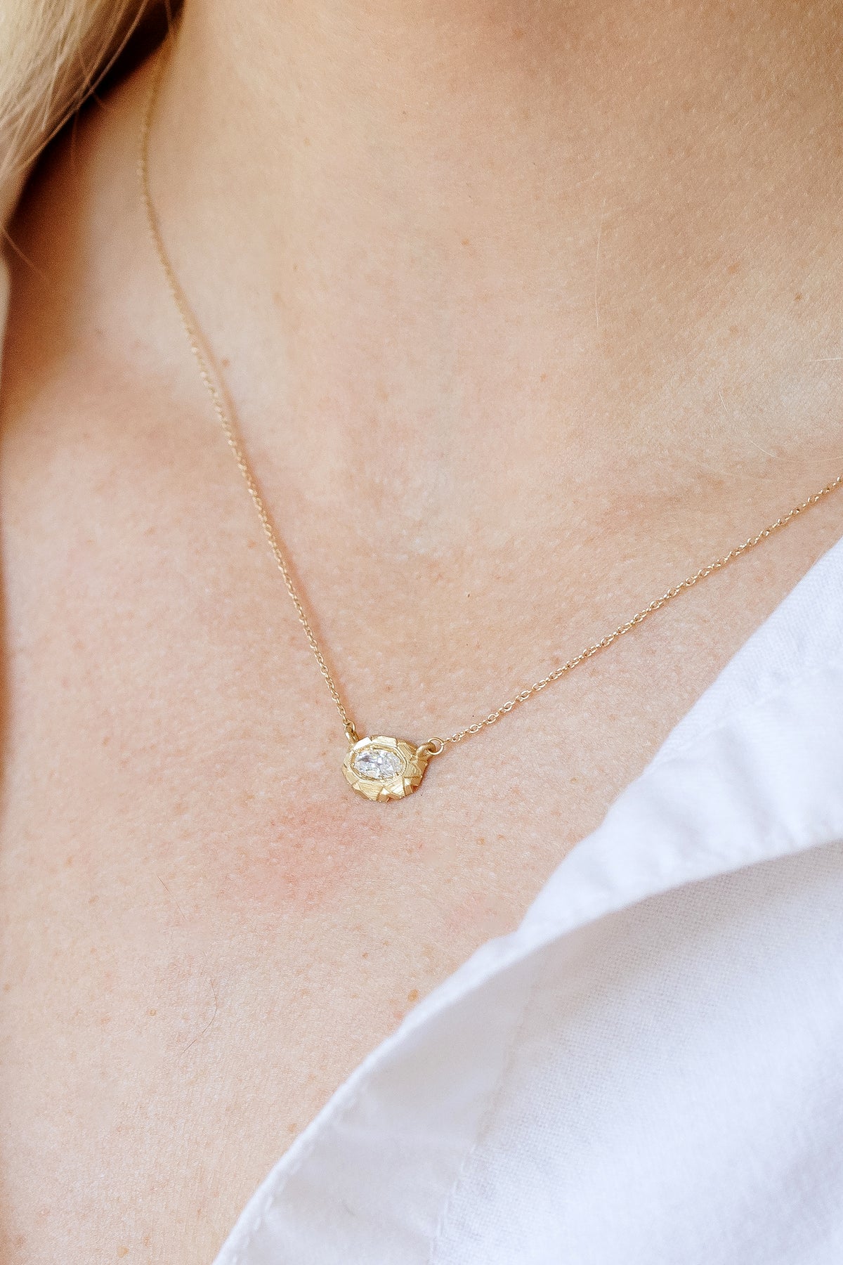 Torvi diamond necklace in 14k yellow gold by Erin Cuff.