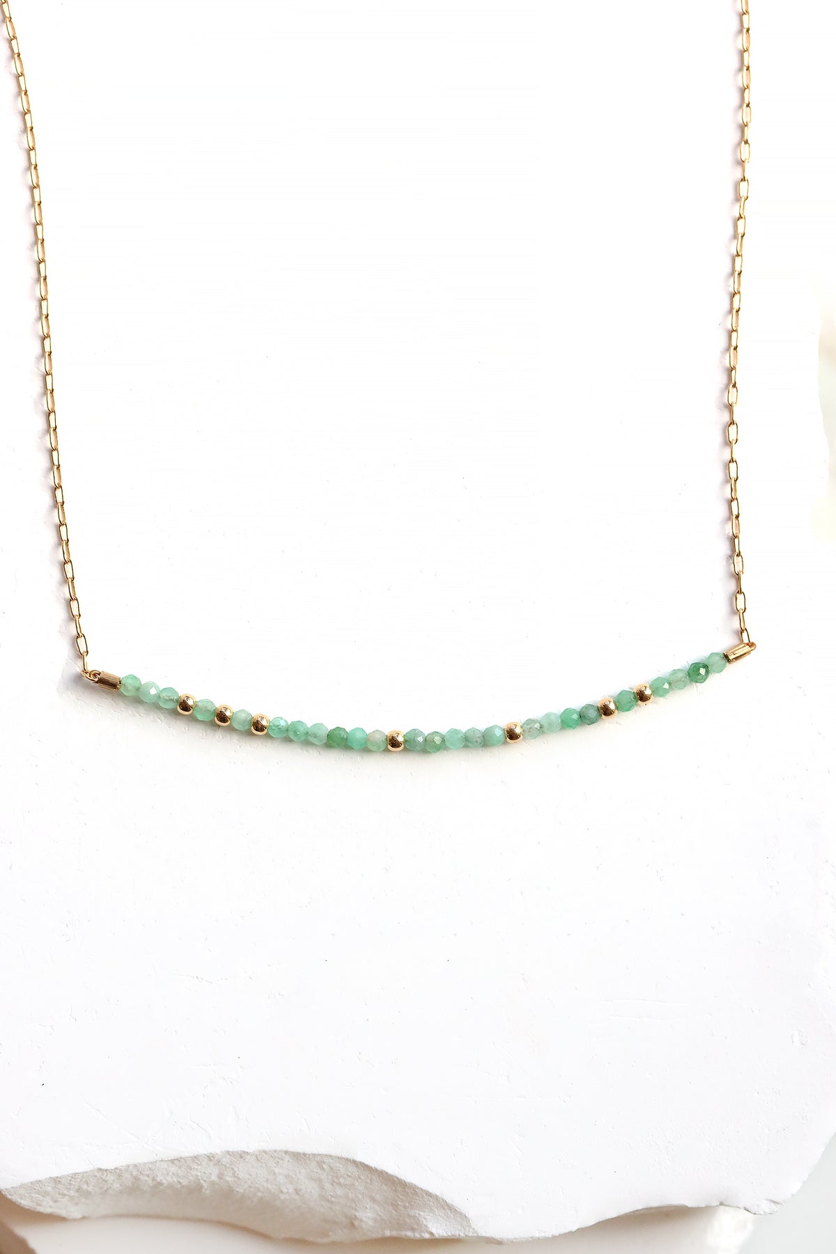 May birthstone bar necklace with emerald beads on a gold filled chain.