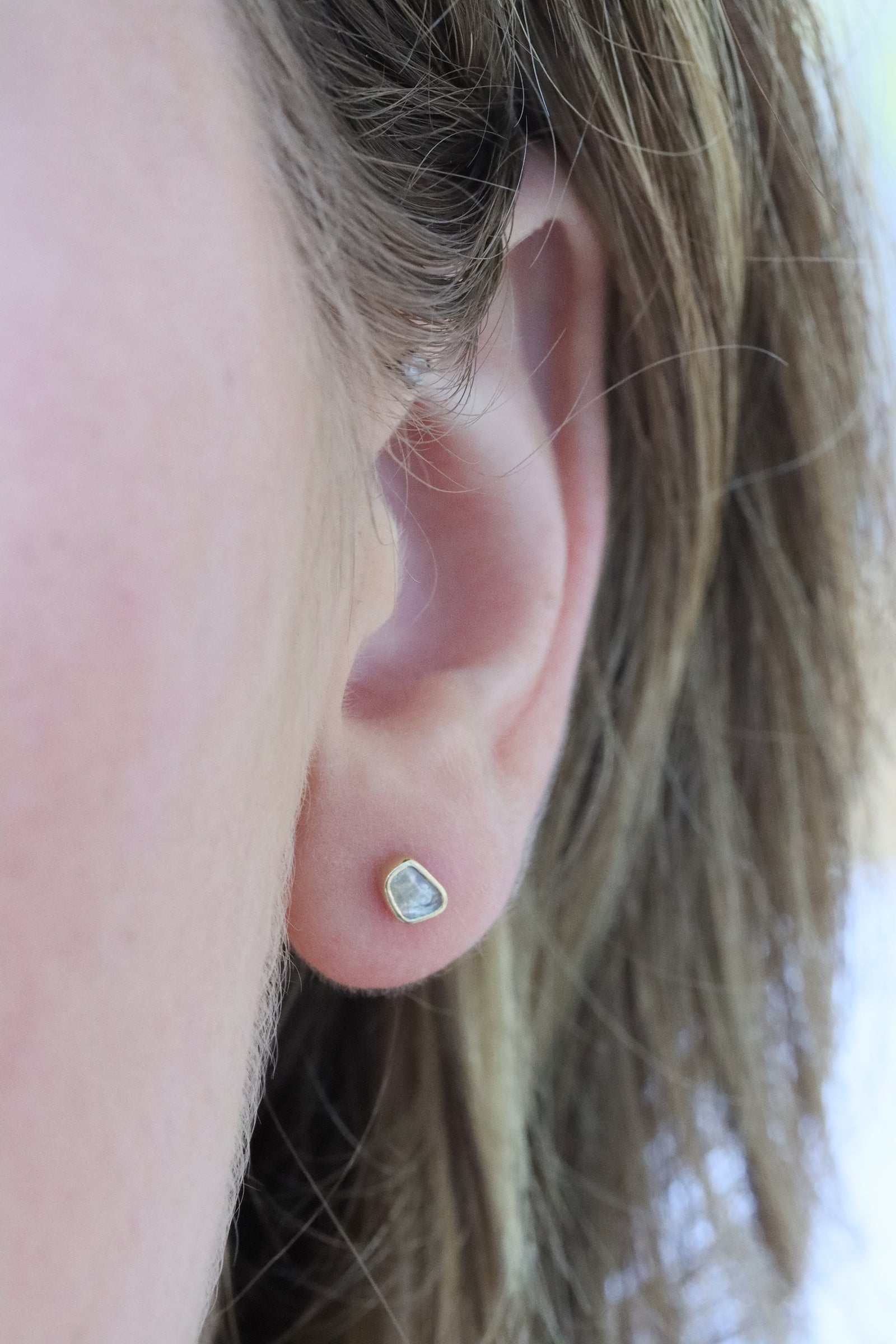 Grey diamond slice single earring in 14k yellow gold by Celine Daoust.