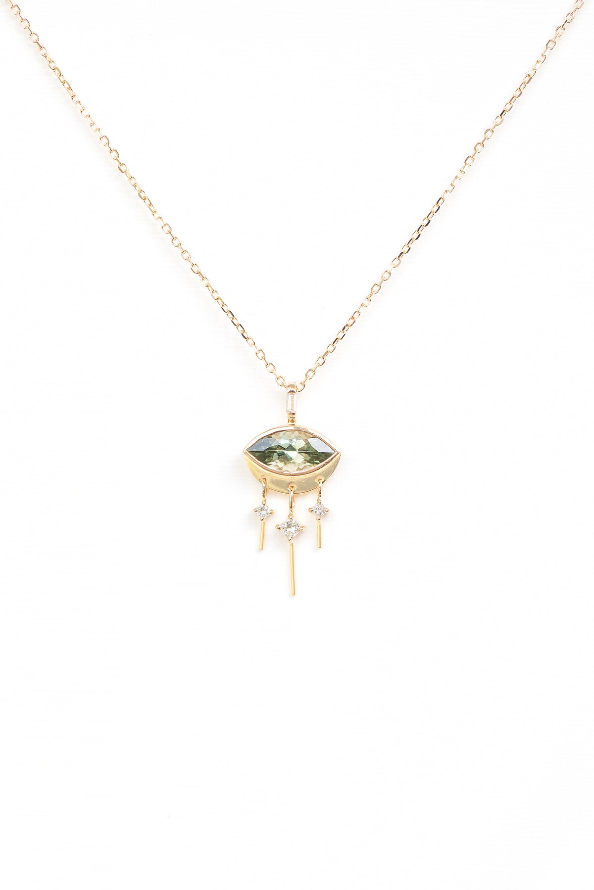Close-up of the dark green marquise-cut tourmaline eye pendant with dangling diamonds by Celine Daoust