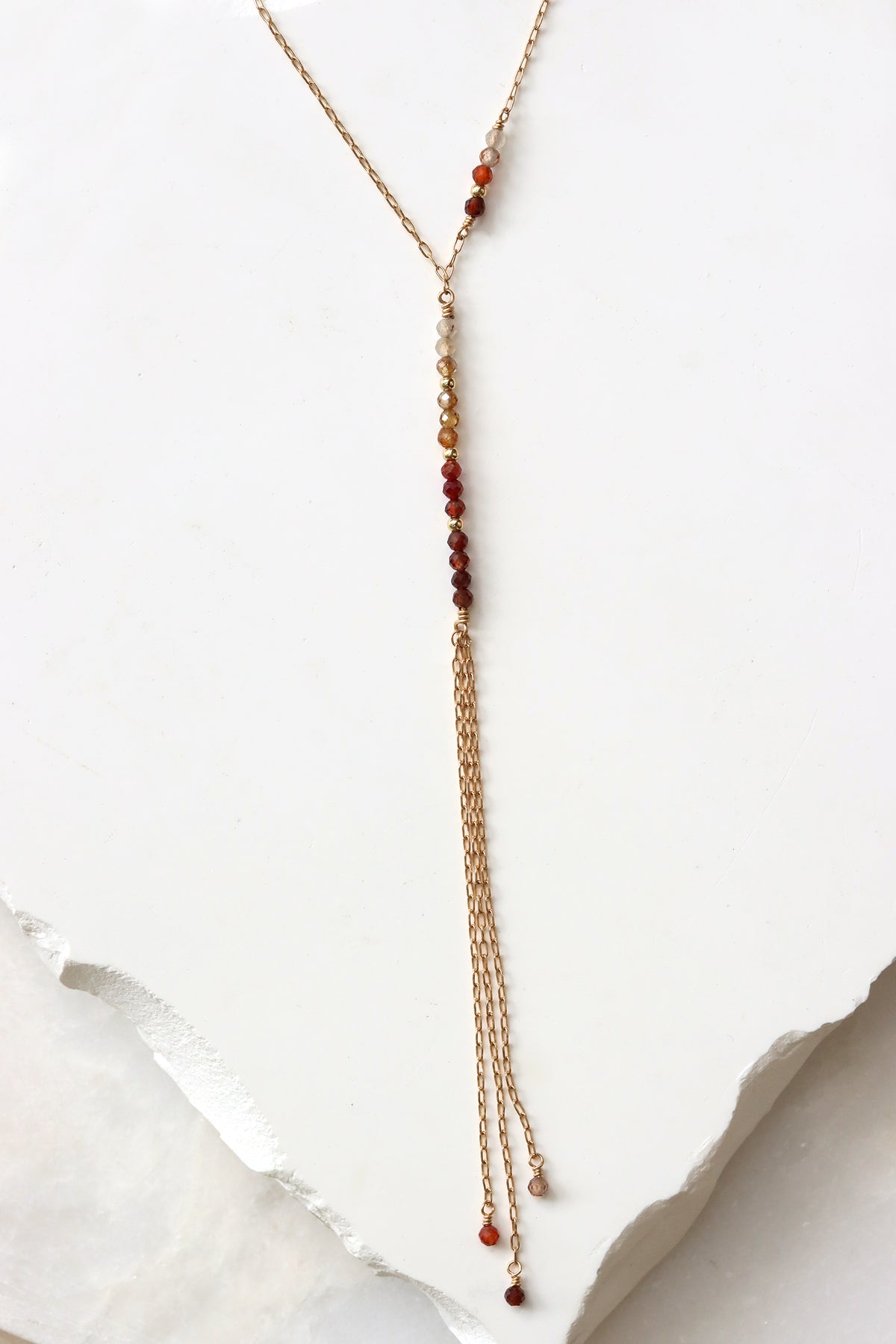 Chocolate zircon Y-necklace with faceted gemstone drops and gold filled chain fringe, handmade by Mickey Lynn in Atlanta