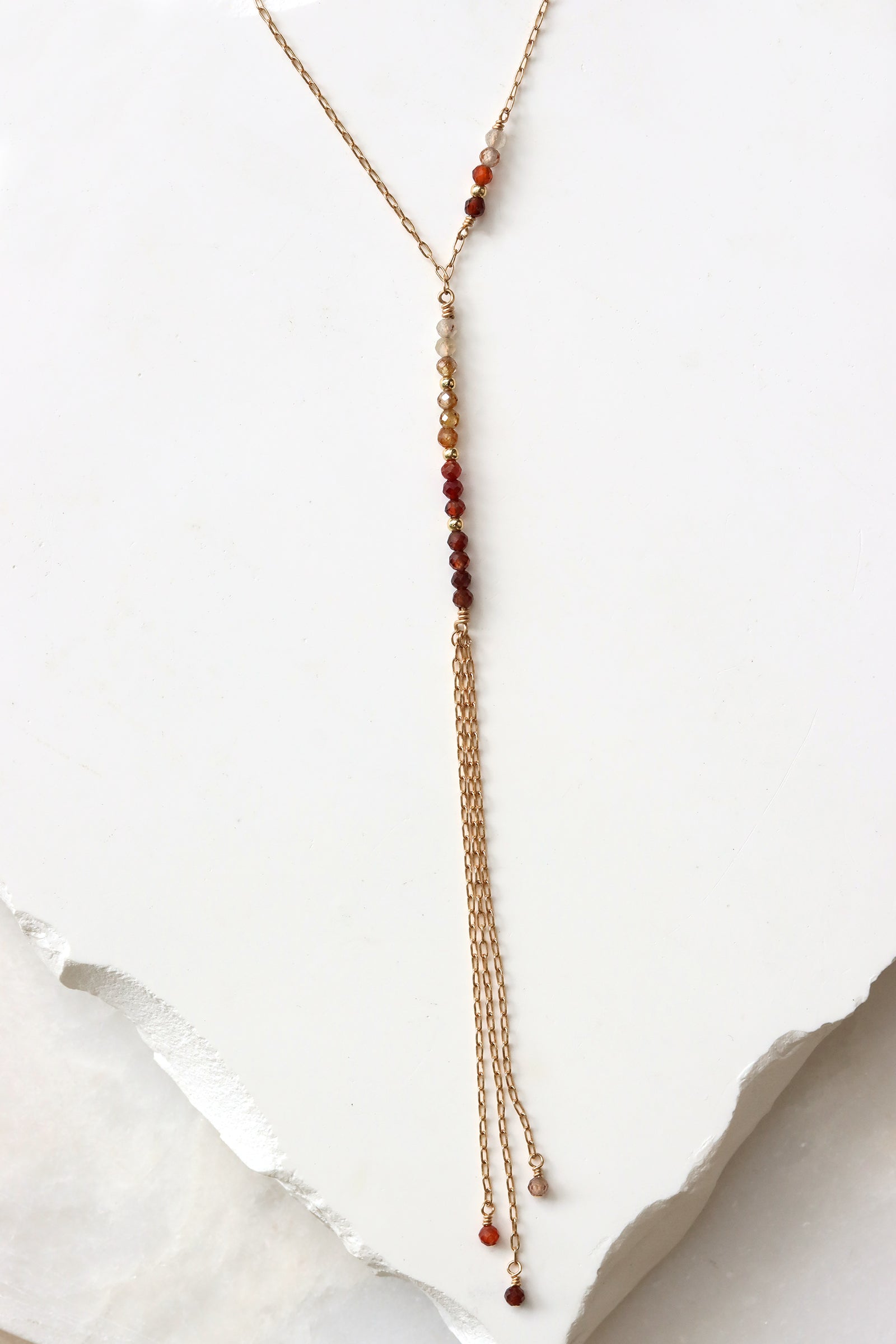 Chocolate zircon Y-necklace with faceted gemstone drops and gold filled chain fringe, handmade by Mickey Lynn in Atlanta
