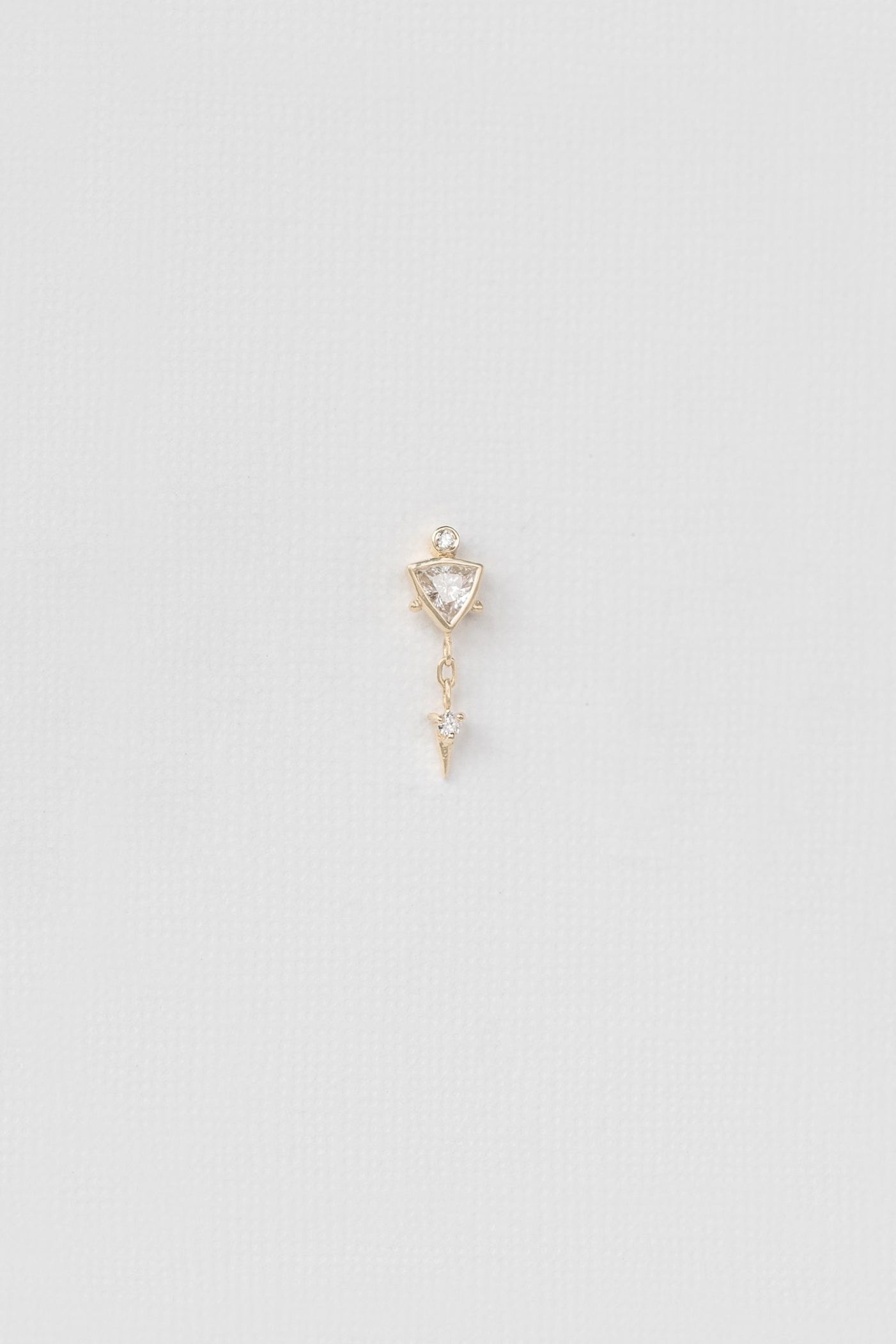 Celine Daoust diamond triangle single earring in 14k gold with dangling detail. Mandala inspired, available at Mickey Lynn.