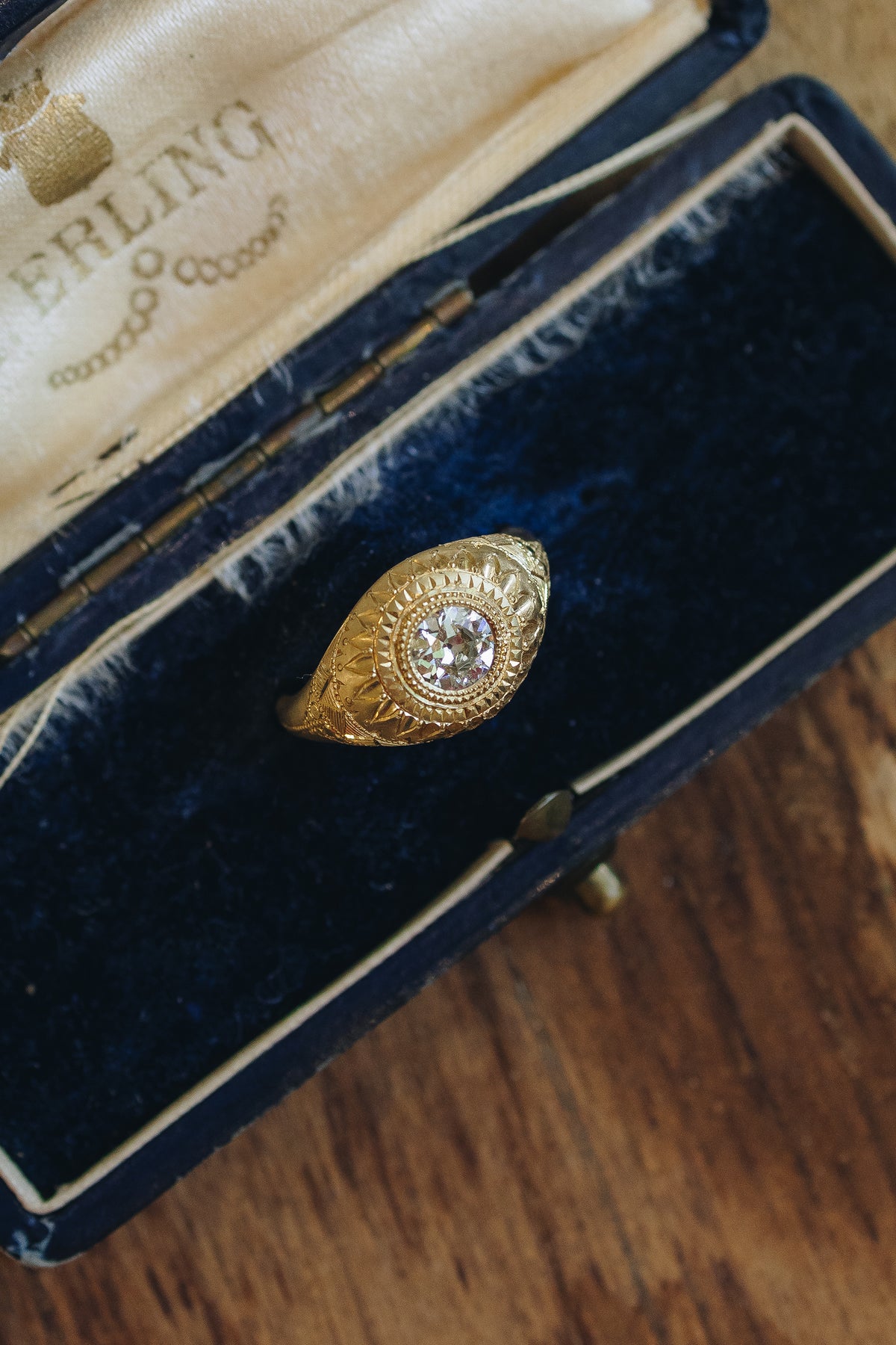 Tutta Volta solitaire ring in 18k gold with an old European cut diamond by Erin Cuff.