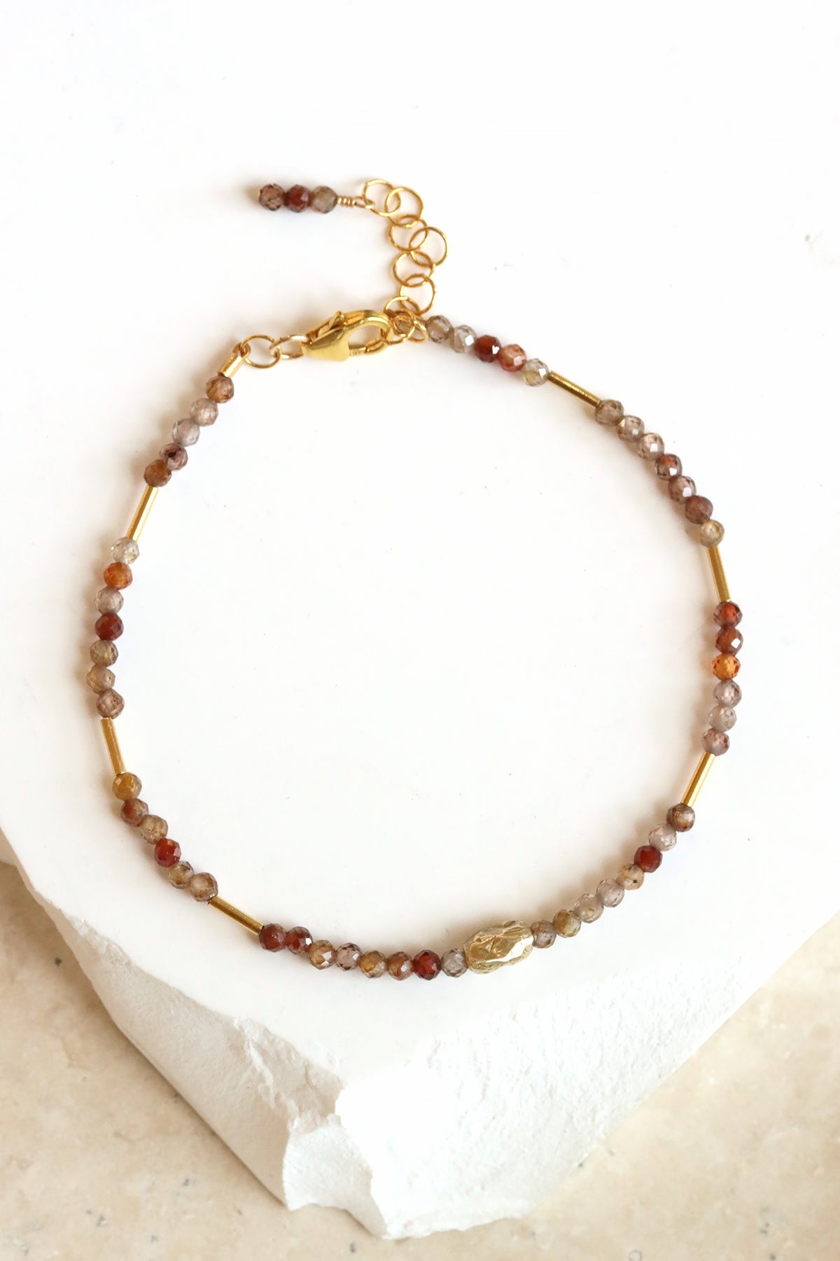 Chocolate zircon and liquid gold bracelet with hand-carved gold bead, handmade by Mickey Lynn in Atlanta