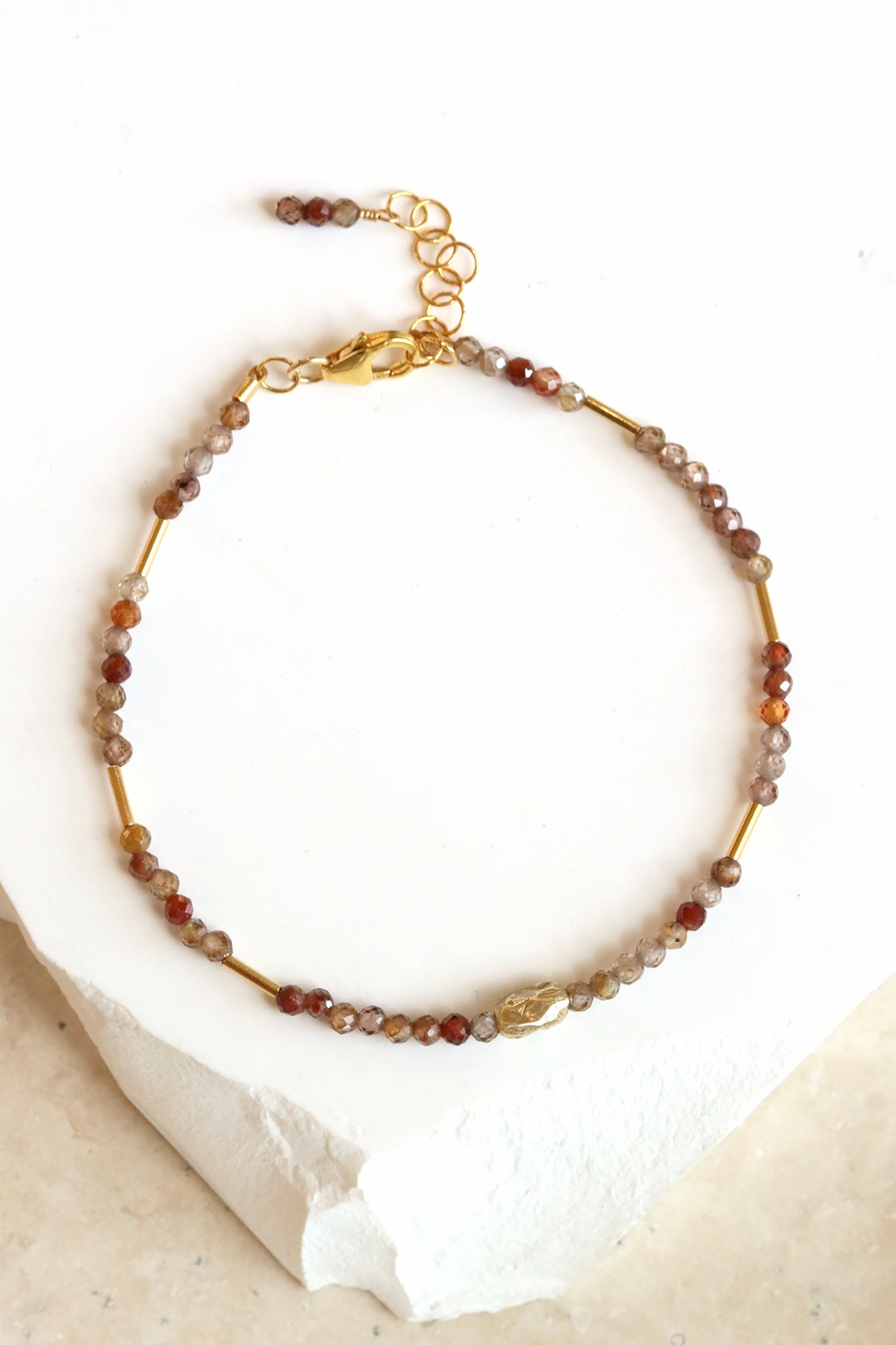 Chocolate zircon and liquid gold bracelet with hand-carved gold bead, handmade by Mickey Lynn in Atlanta